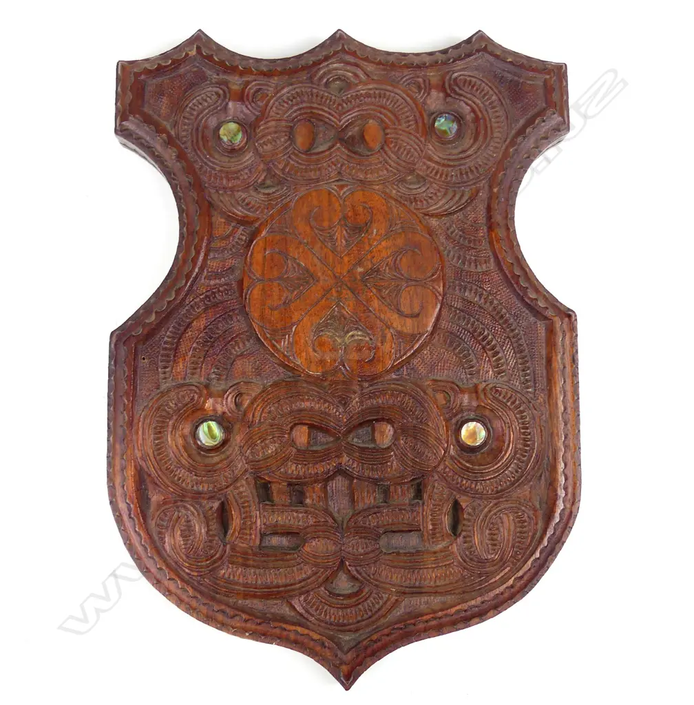 A Maori folk art carved mahogany shield Image 1++