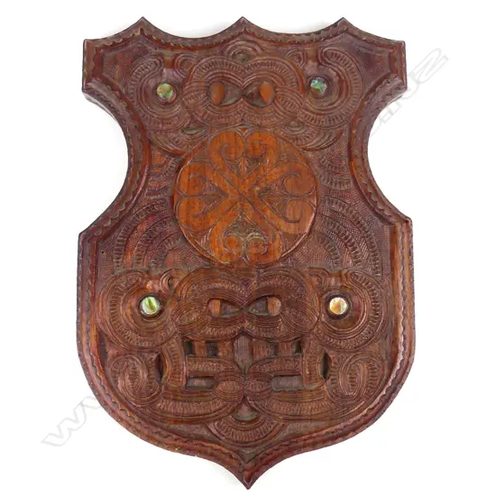 A Maori folk art carved mahogany shield
