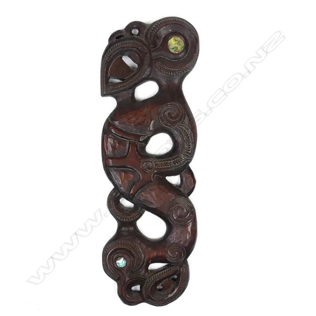 A 1970s Maori carved wall plaque by Norm Clark (1942-2016) Image 1++