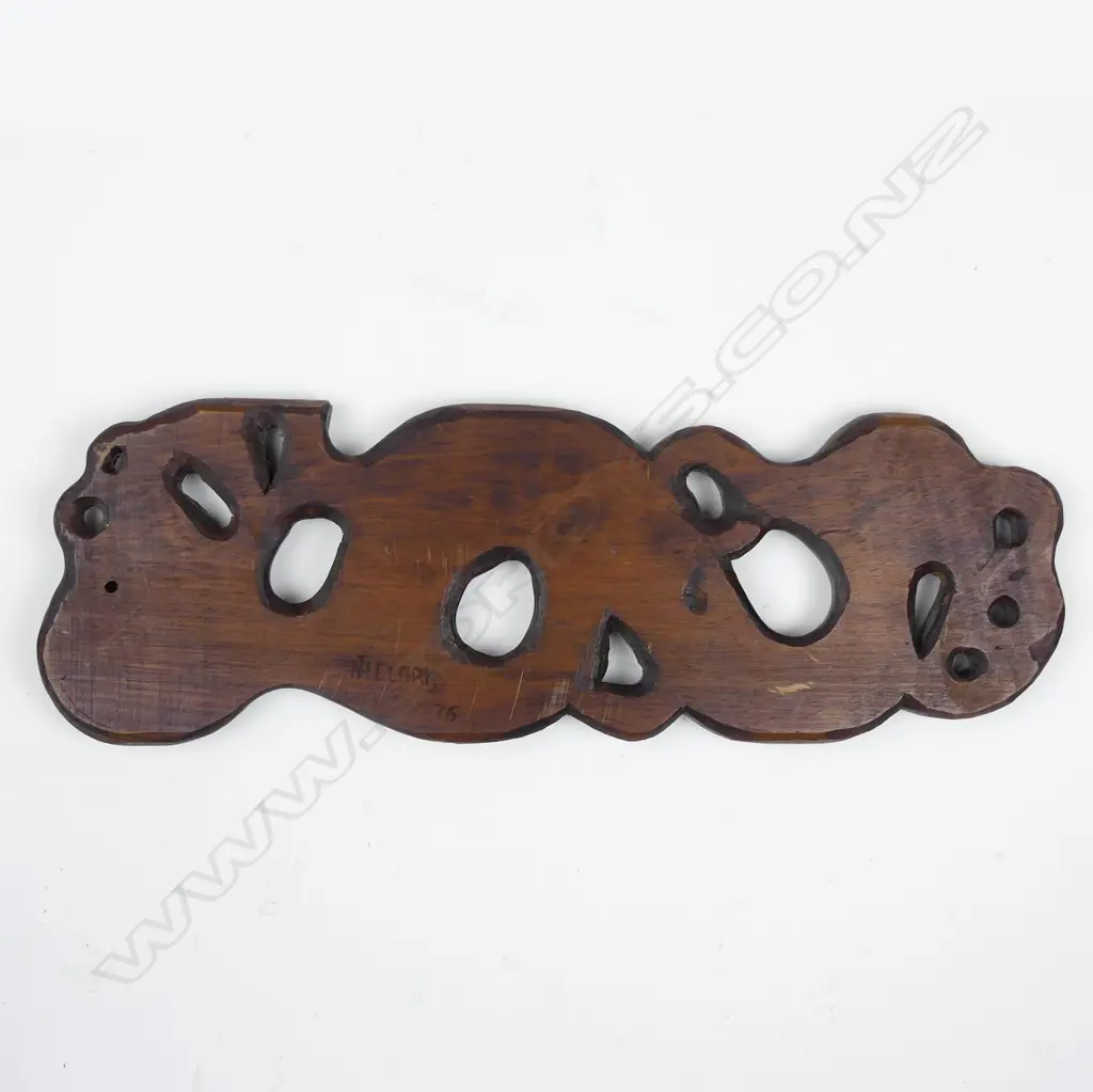 A 1970s Maori carved wall plaque by Norm Clark (1942-2016) Image 1++