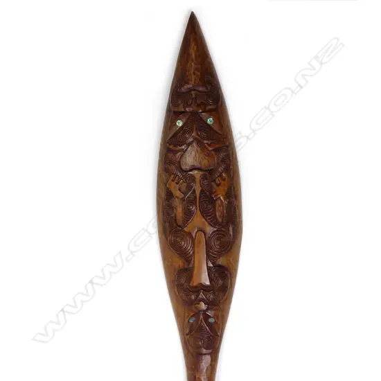 A Maori souvenir carved waka paddle