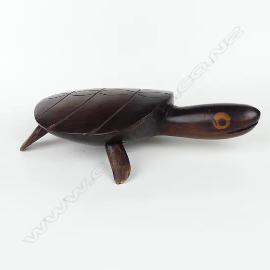 A carved tou wood Pitcairn Island souvenir turtle