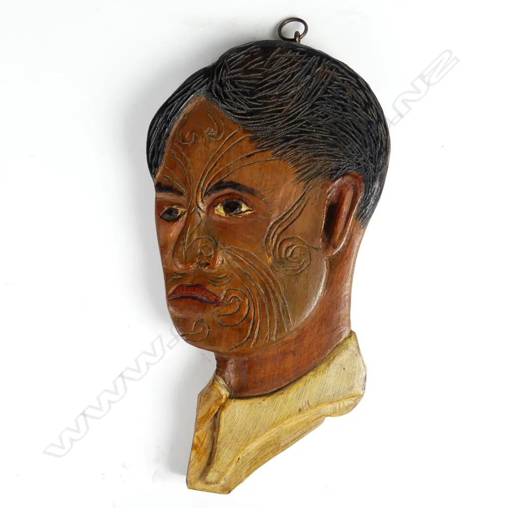 A Jane Brenkley carved and painted portrait bust of a young Maori man Image 1++