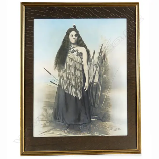 A hand coloured photograph of a Maori woman