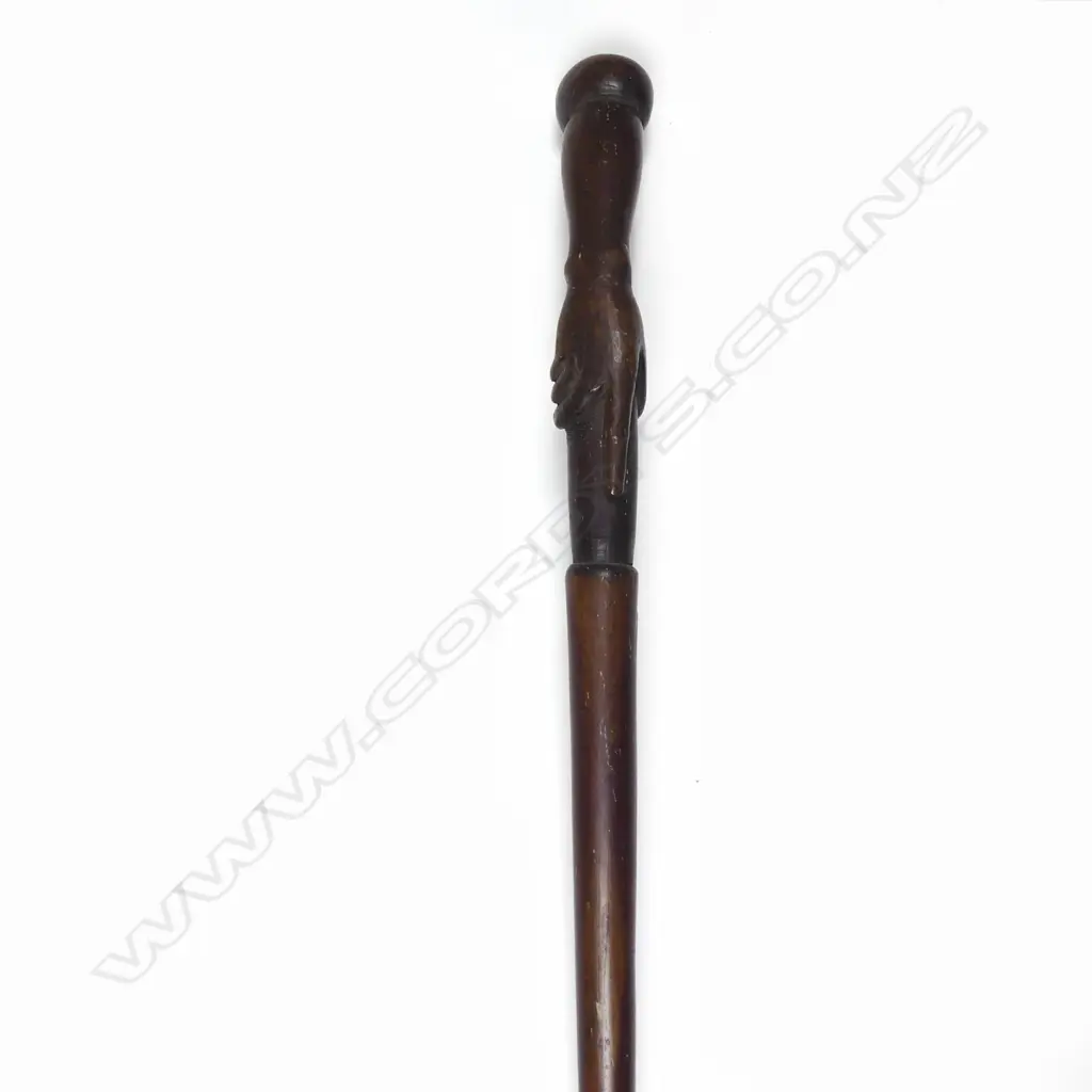 A late 19thC hardwood carved clasped hand handled walking stick Image 1++