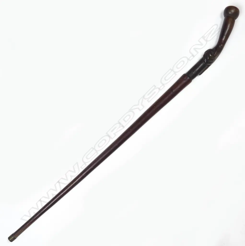 A late 19thC hardwood carved clasped hand handled walking stick Image 1++