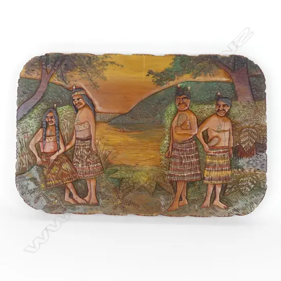 A Jane Brenkley carved and painted Maori themed table top/wall plaque
