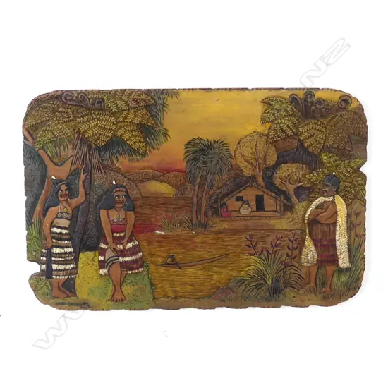 An oblong Jane Brenkley carved and painted Maori themed table top/wall plaque