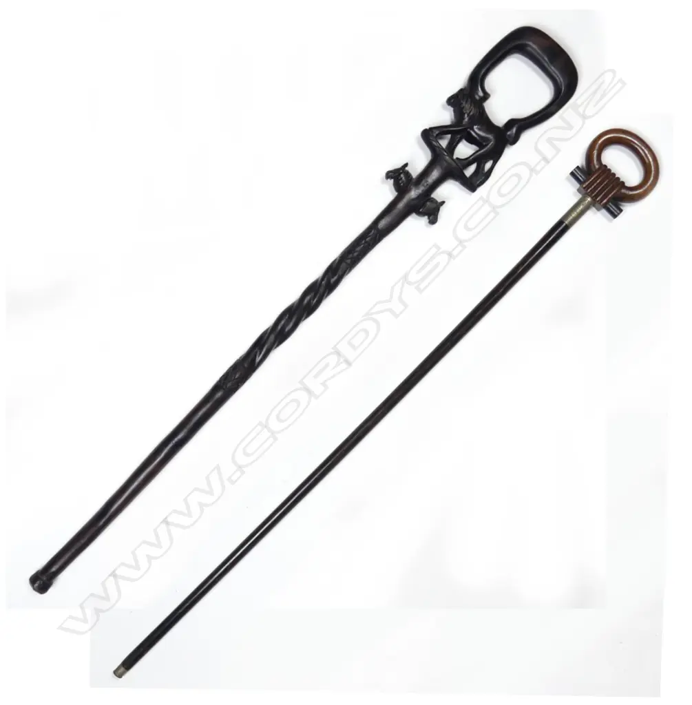 Two early 20thC decorative walking sticks Image 1++