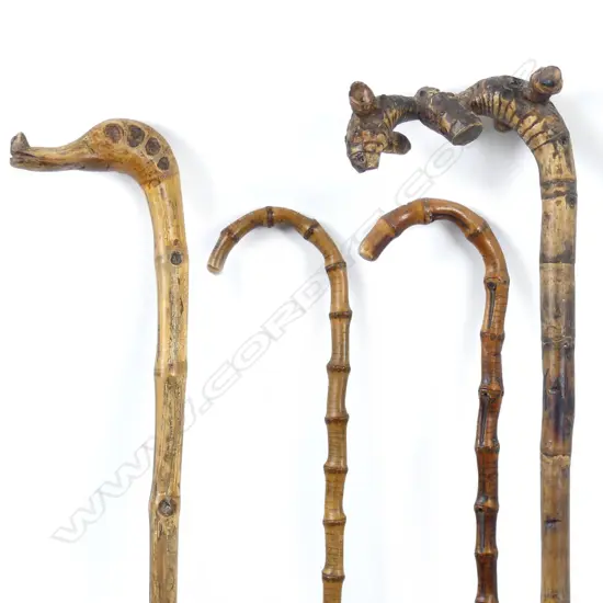 Four vintage bamboo walking stick
