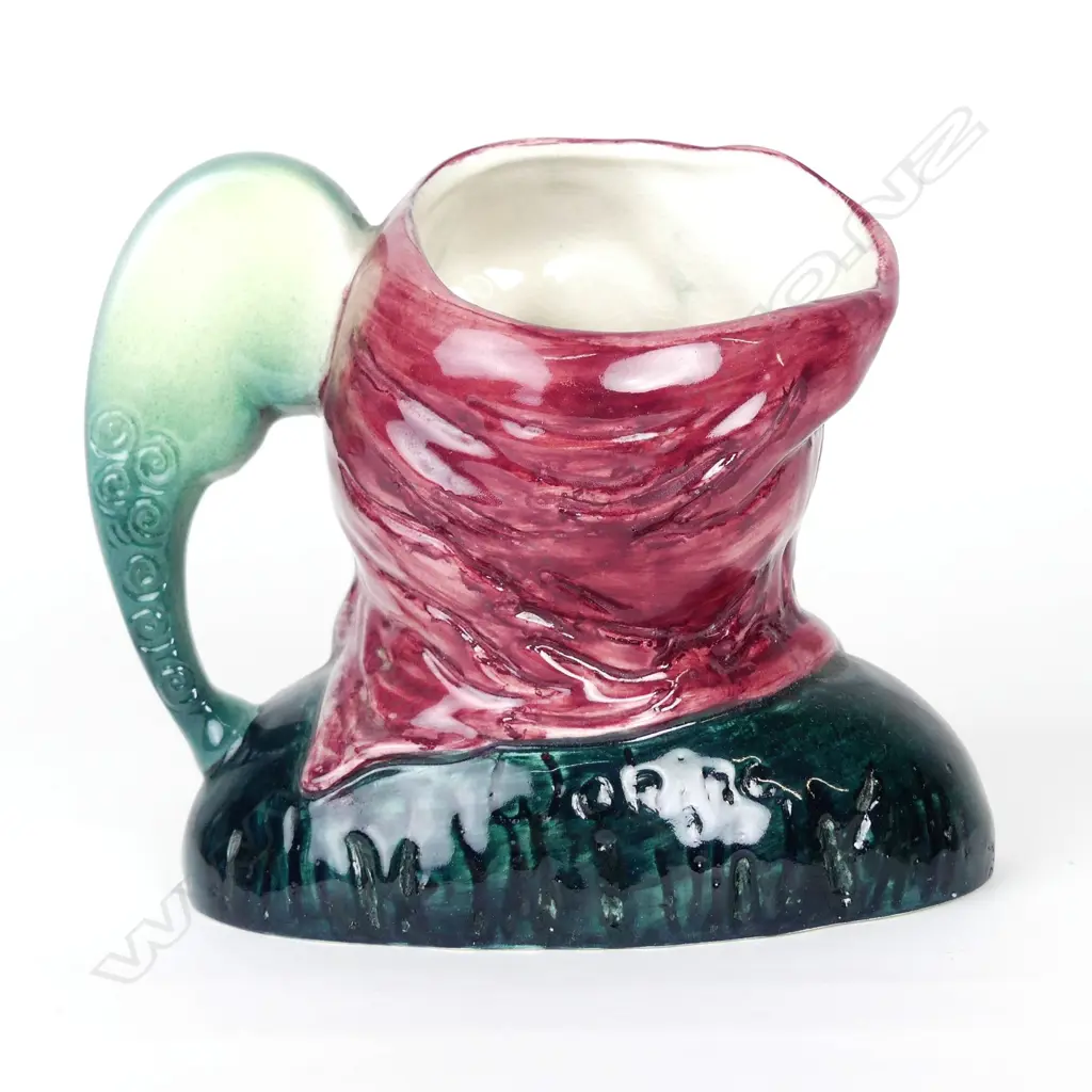 A Titan Studio glazed toby jug in the form of a Māori kuia Image 1++