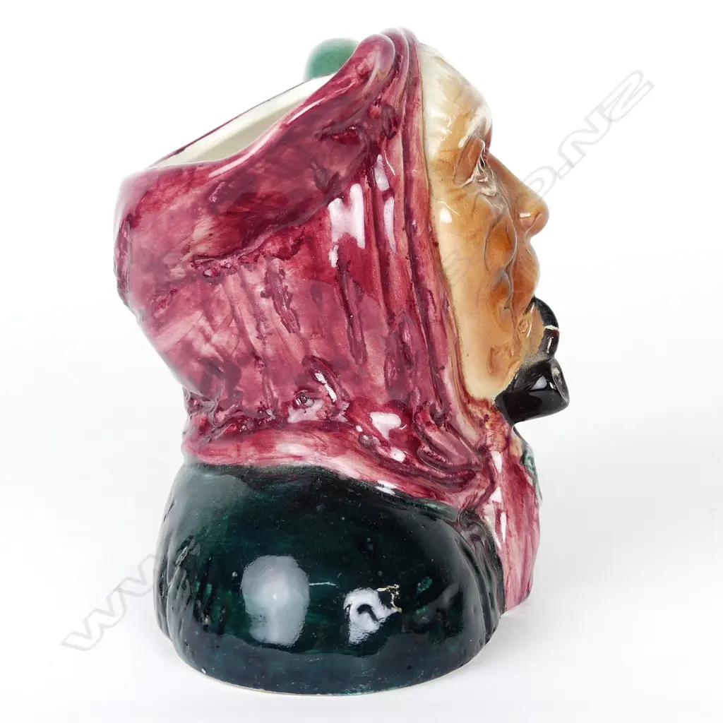 A Titan Studio glazed toby jug in the form of a Māori kuia Image 1++