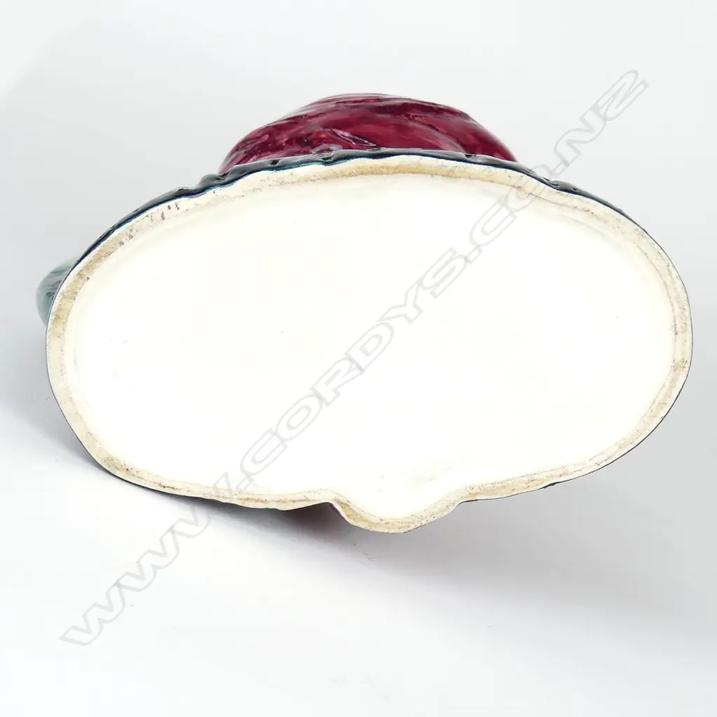 A Titan Studio glazed toby jug in the form of a Māori kuia Image 1++