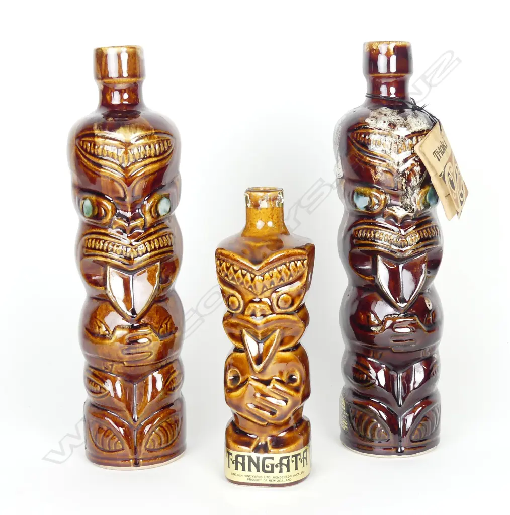 Three Ti-Toki liqueur bottles Image 1++