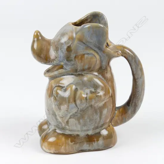A Crown Lynn trickle glaze Mickey Mouse jug