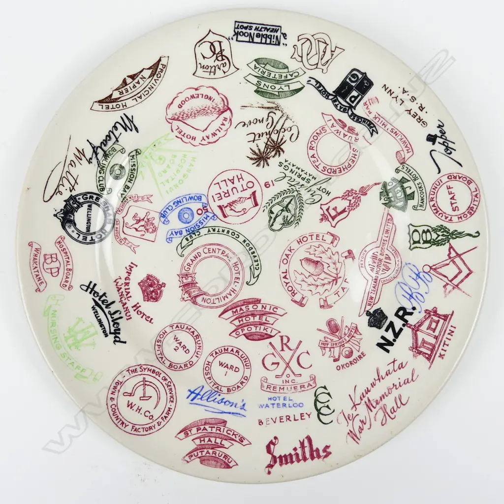 A Crown Lynn (unmarked) circular plate decorated with various hotel Image 1++