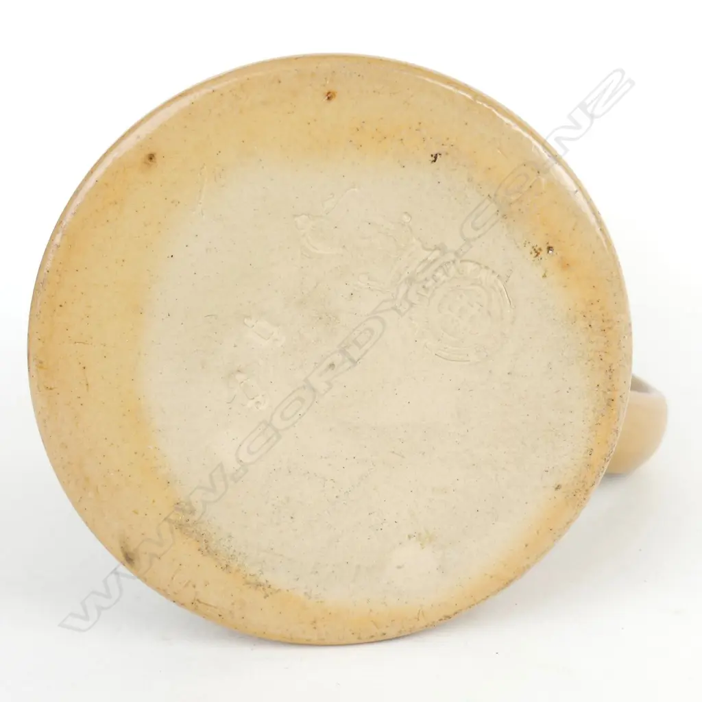 A Royal Doulton salt glaze buff coloured mug Image 1++