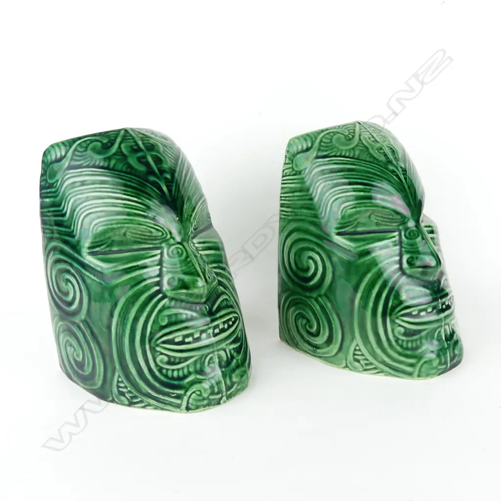 A pair of Crown Lynn Wharetana ware 'Moko' bookends Image 1++