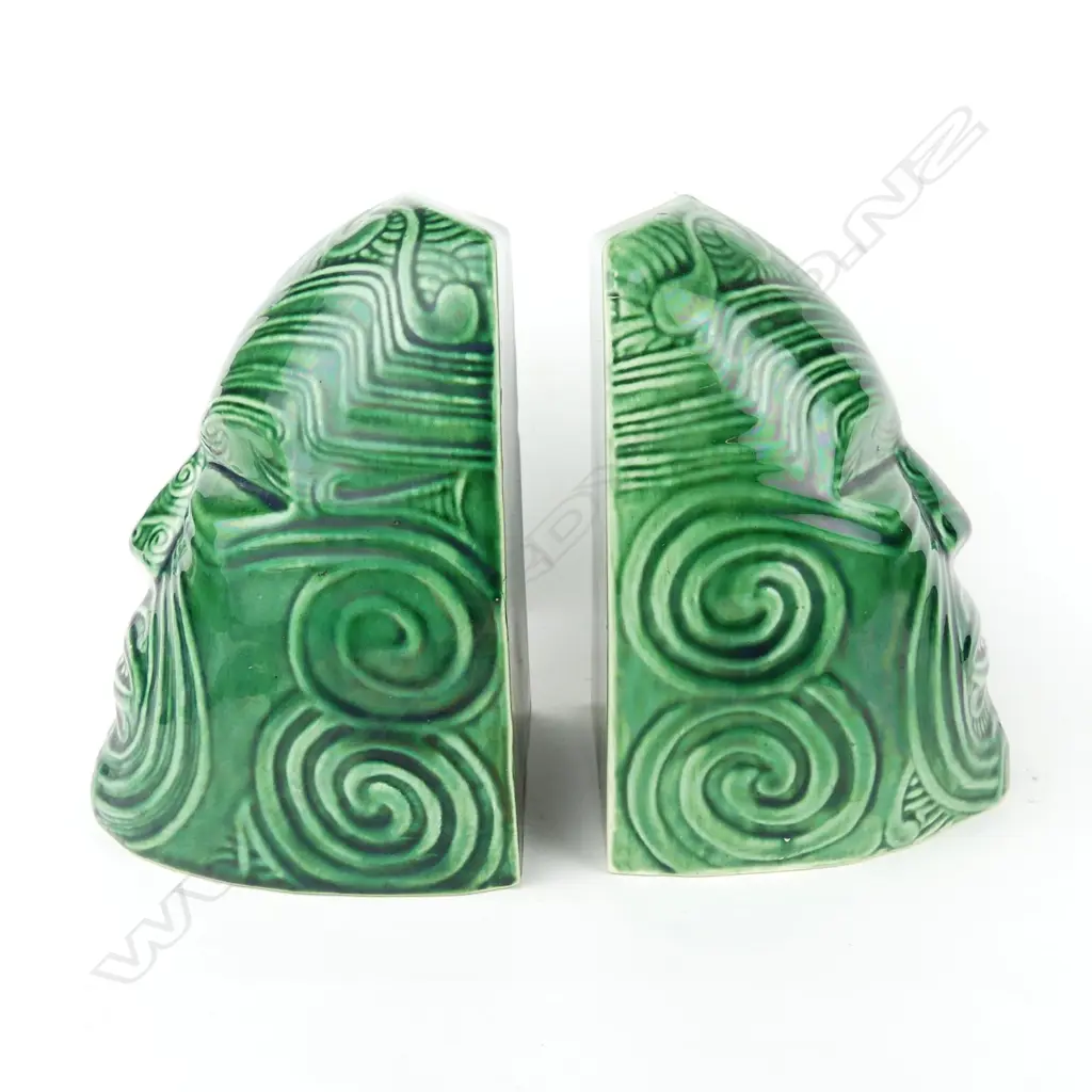 A pair of Crown Lynn Wharetana ware 'Moko' bookends Image 1++
