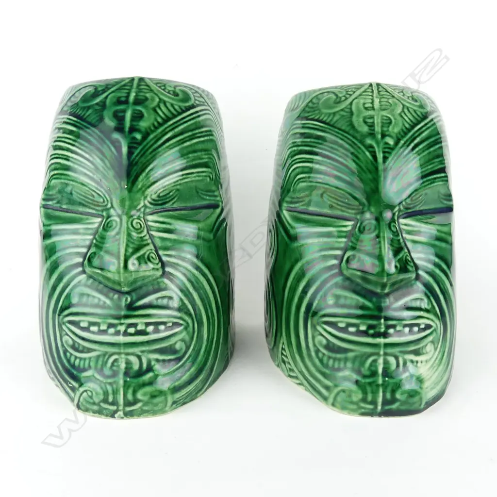 A pair of Crown Lynn Wharetana ware 'Moko' bookends Image 1++