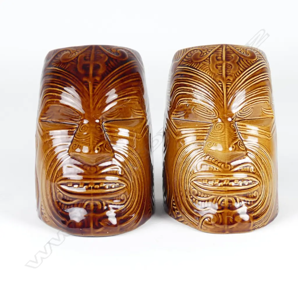 A pair of Crown Lynn Wharetana ware 'Moko' bookends Image 1++