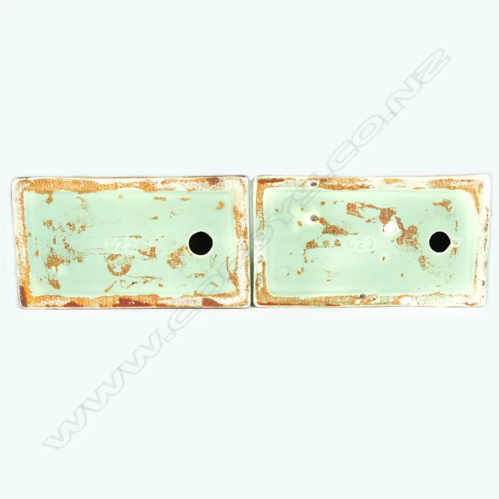 A pair of Crown Lynn Wharetana Maori Art Pottery 'Tiki' bookends Image 1++