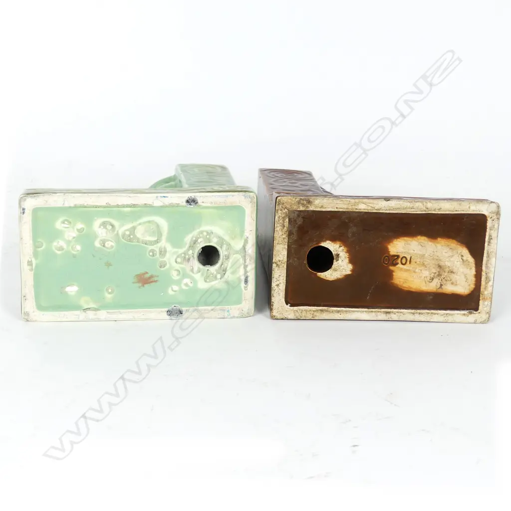 Two Crown Lynn Wharetana 'Tiki' bookends Image 1++
