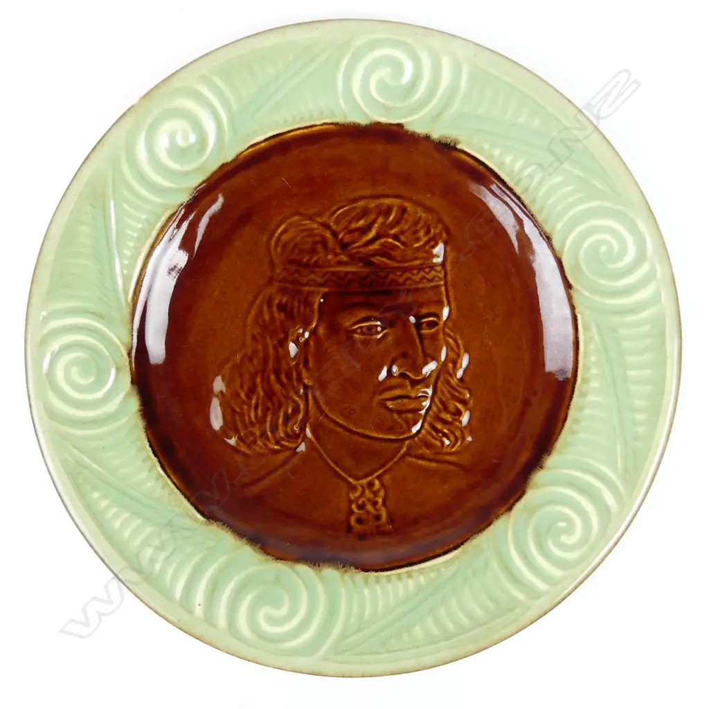 A Crown Lynn Wharetana ware wall plate 'Puhi Urutapu Tamahine' Image 1++