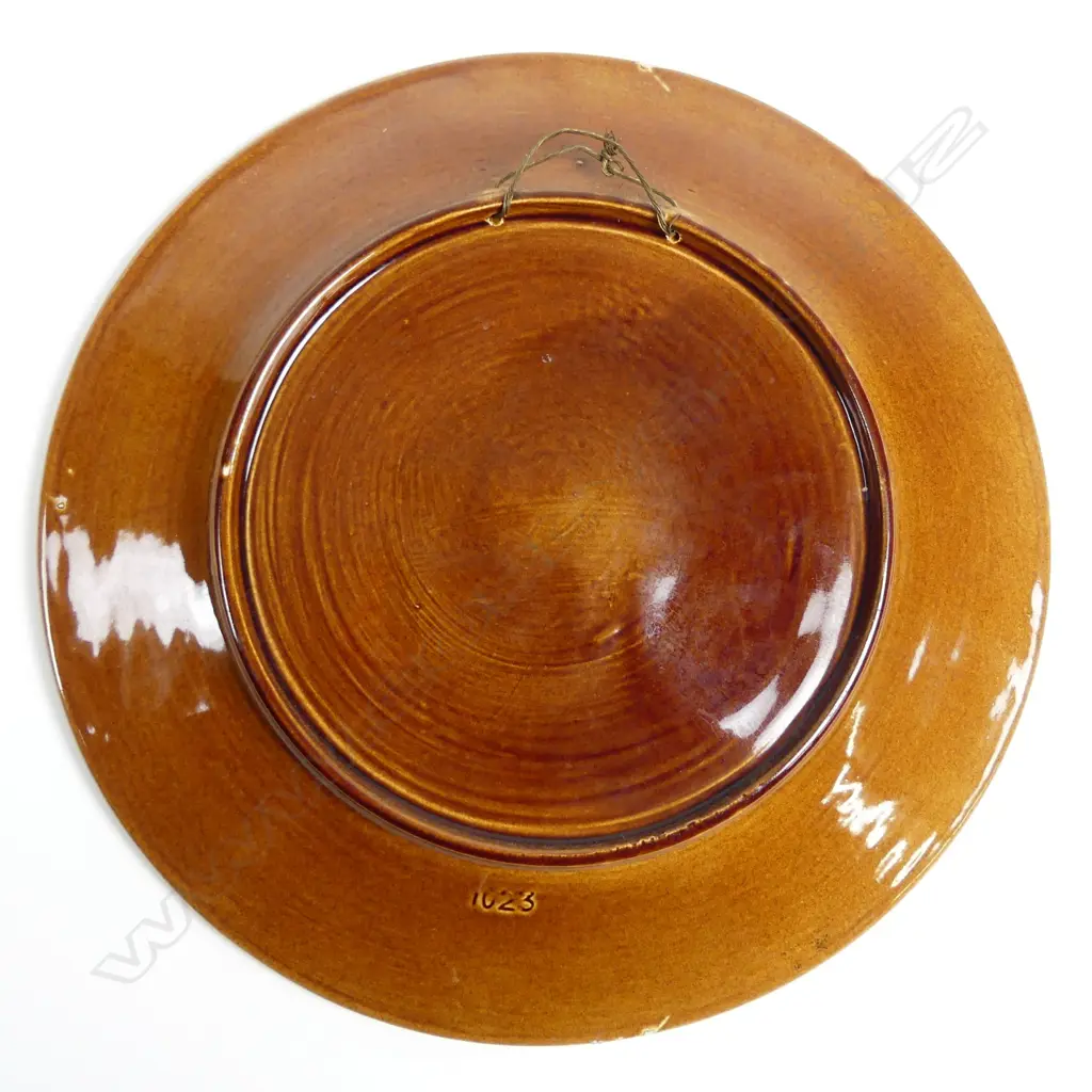 A Crown Lynn Wharetana ware wall plate 'Puhi Urutapu Tamahine' Image 1++