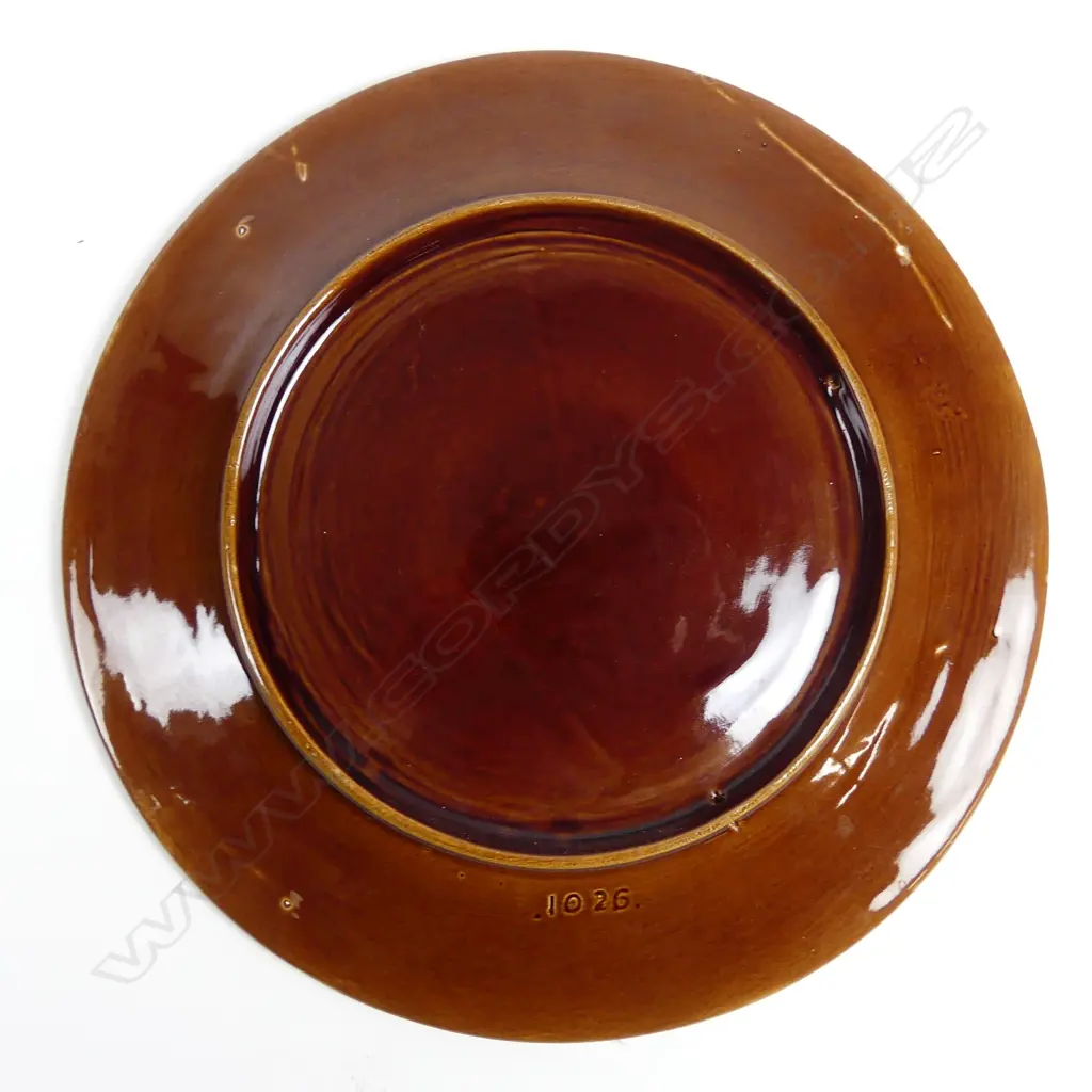 A Crown Lynn Wharetana ware wall plate Image 1++
