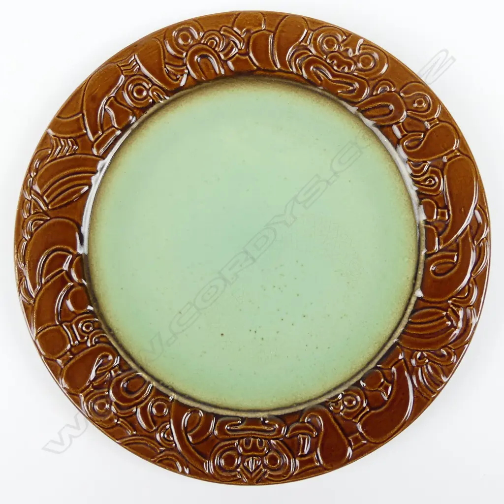 A Crown Lynn Wharetana ware wall plate Image 1++