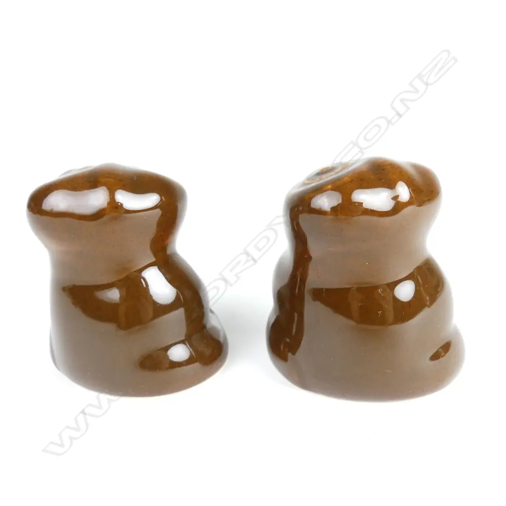 A pair of rare Crown Lynn Wharetana Maori Art Pottery salt and pepper shakers Image 1++