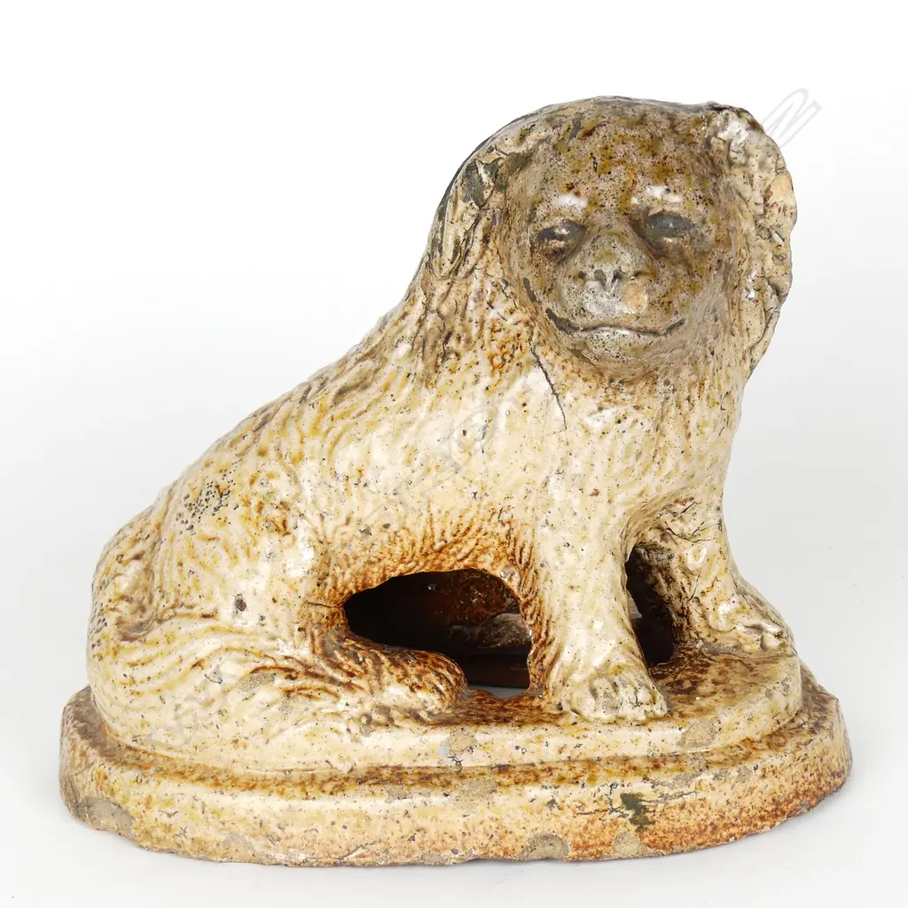 An NZ colonial pottery salt glazed dog doorstop Image 1++