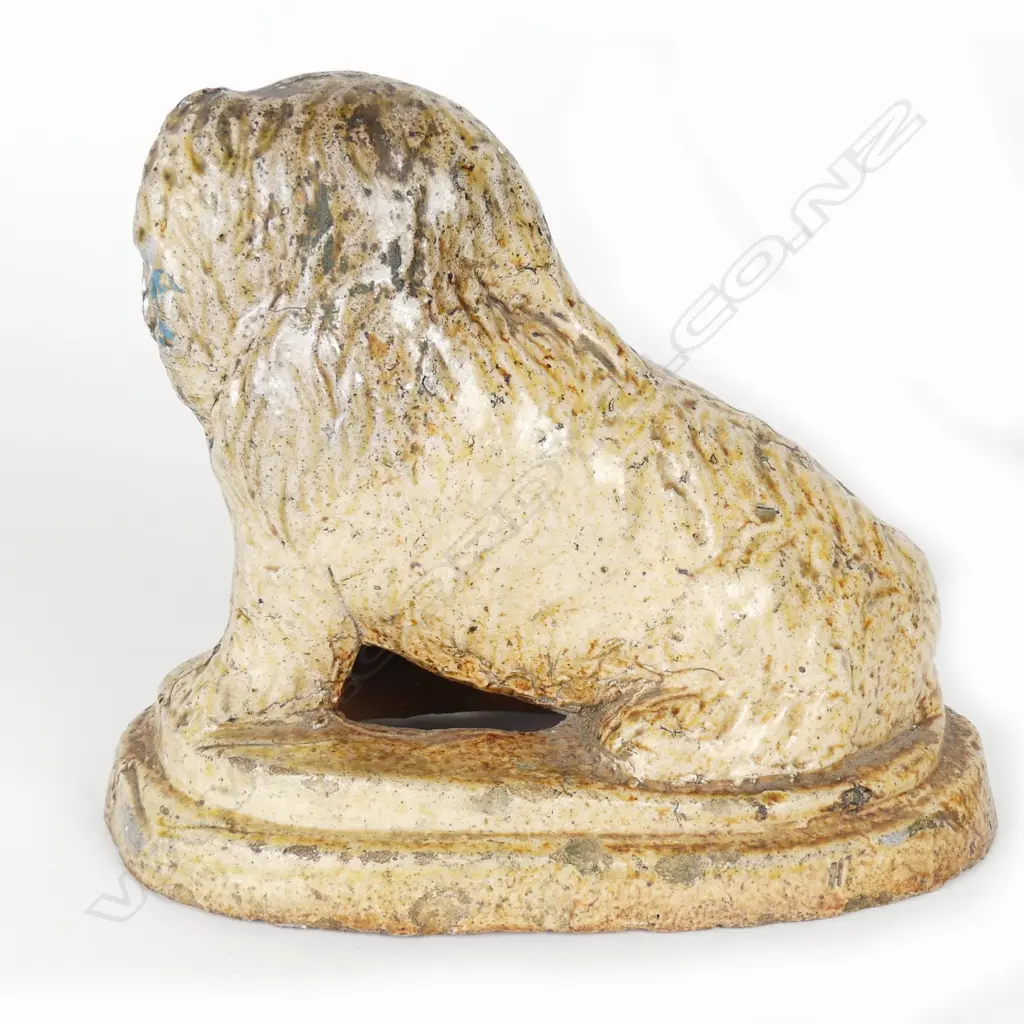 An NZ colonial pottery salt glazed dog doorstop Image 1++