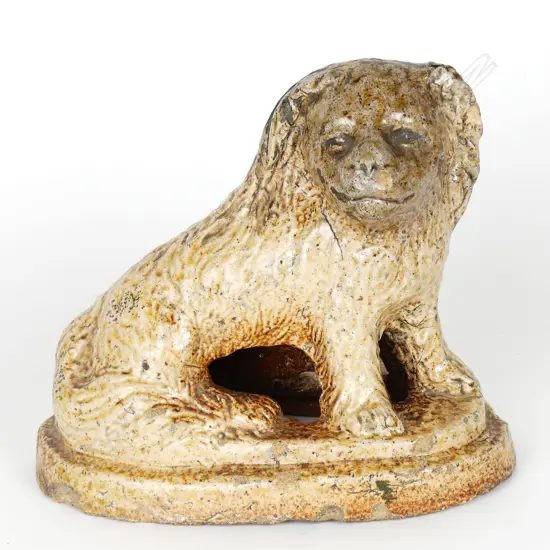 An NZ colonial pottery salt glazed dog doorstop