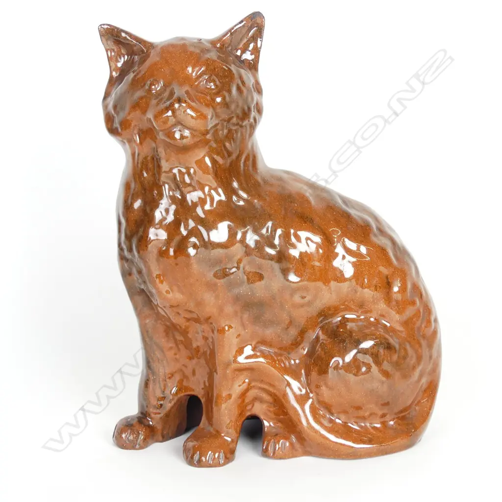 A vintage dark terracotta Staffordshire type cat Image 1++
