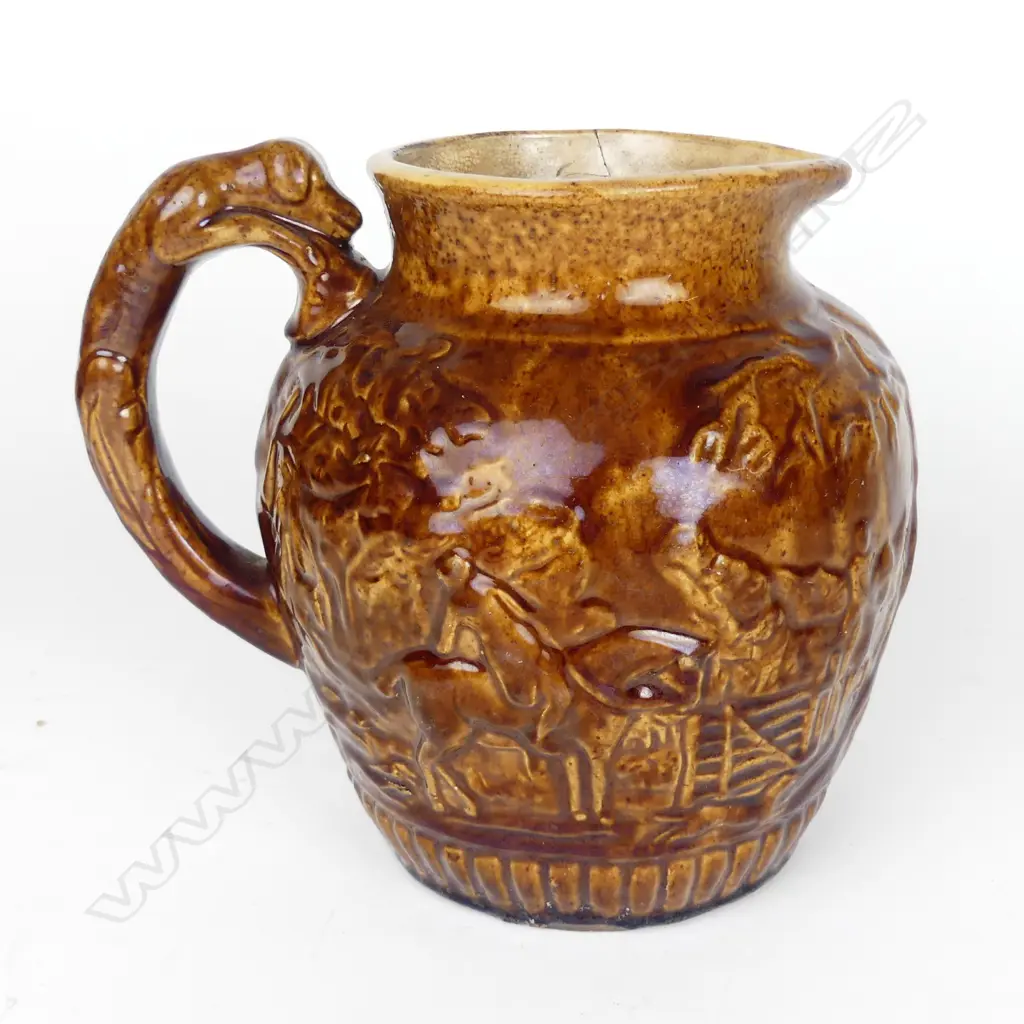 A colonial pottery hunting jug Image 1++