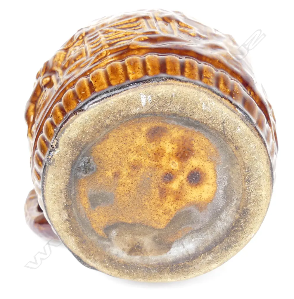 A colonial pottery hunting jug Image 1++