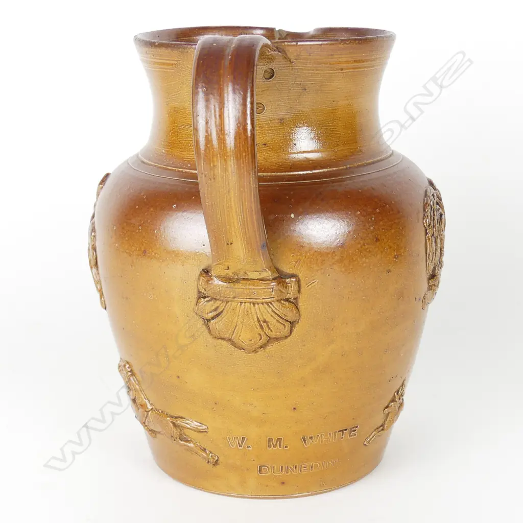 A rare colonial pottery tavern jug marked W.M White Dunedin Image 1++