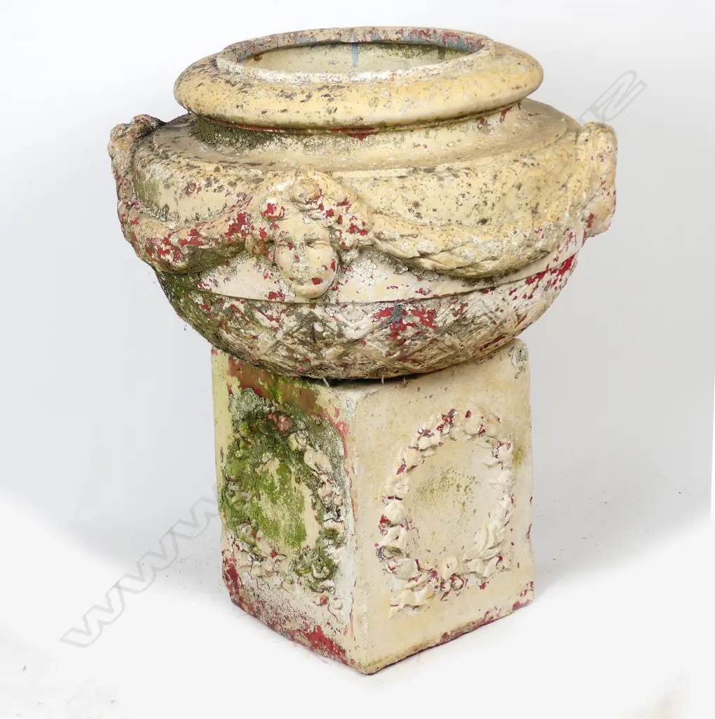 A large pottery garden urn on cube base Image 1++