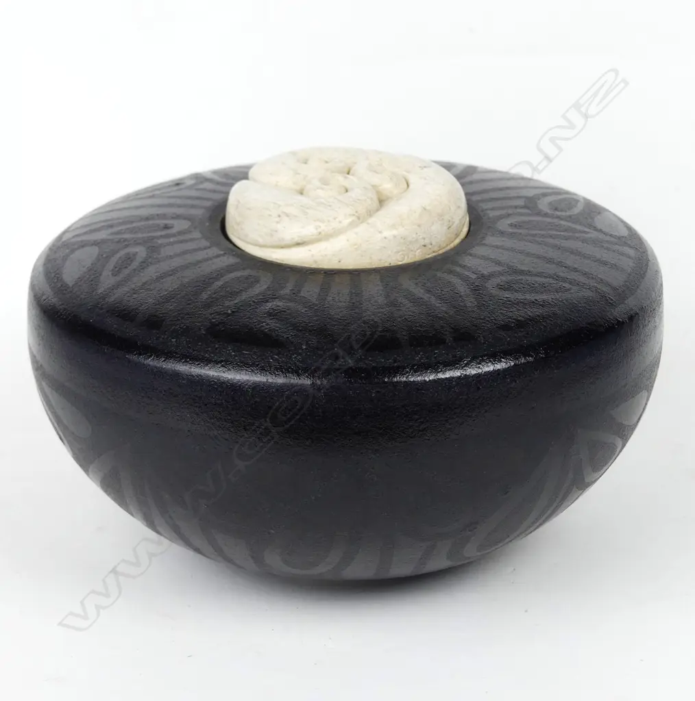 Anneke Borren and Owen Mapp black glazed pot with lid as a carved bone pendant Image 1++
