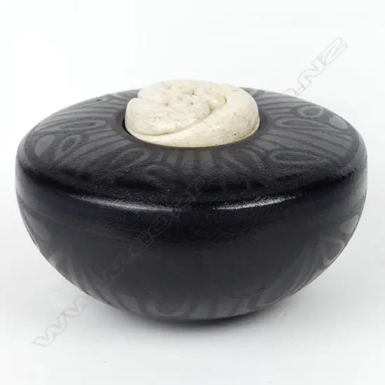 Anneke Borren and Owen Mapp black glazed pot with lid as a carved bone pendant