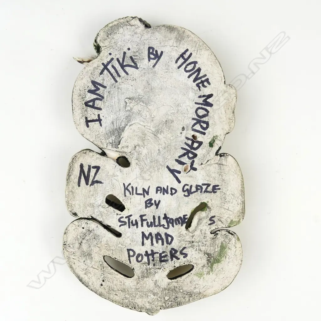 A modern ceramic glazed tiki Image 1++