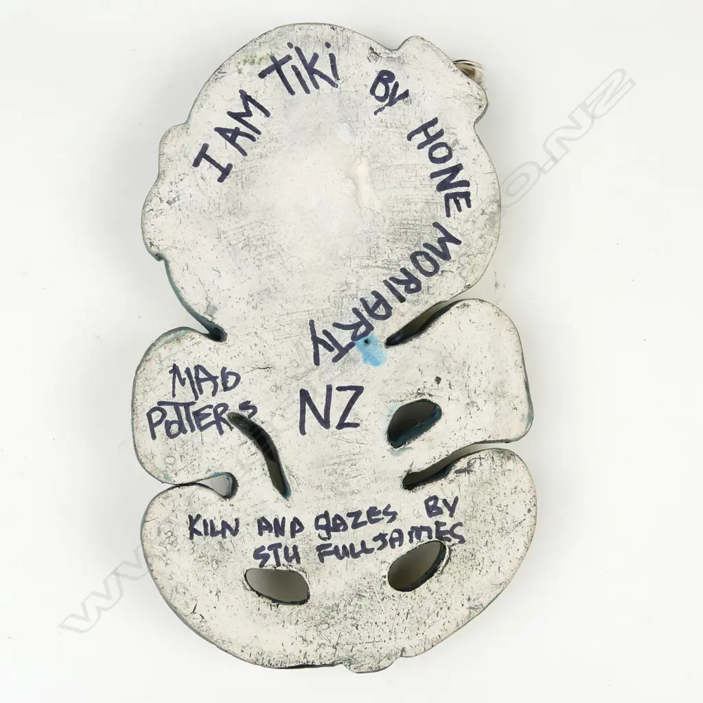 A modern ceramic glazed tiki Image 1++