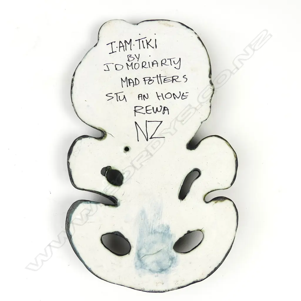 A large sculpted pottery tiki by D.J. Moriarty Image 1++