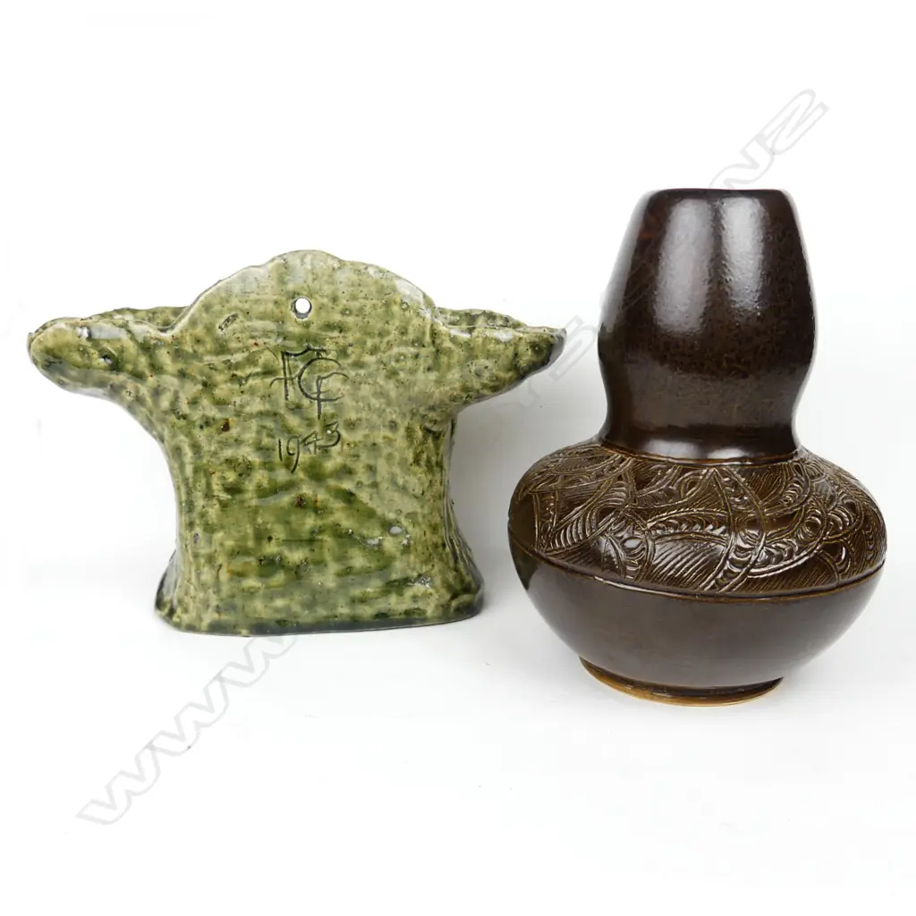 A Maori patterned gourd shaped vase Image 1++