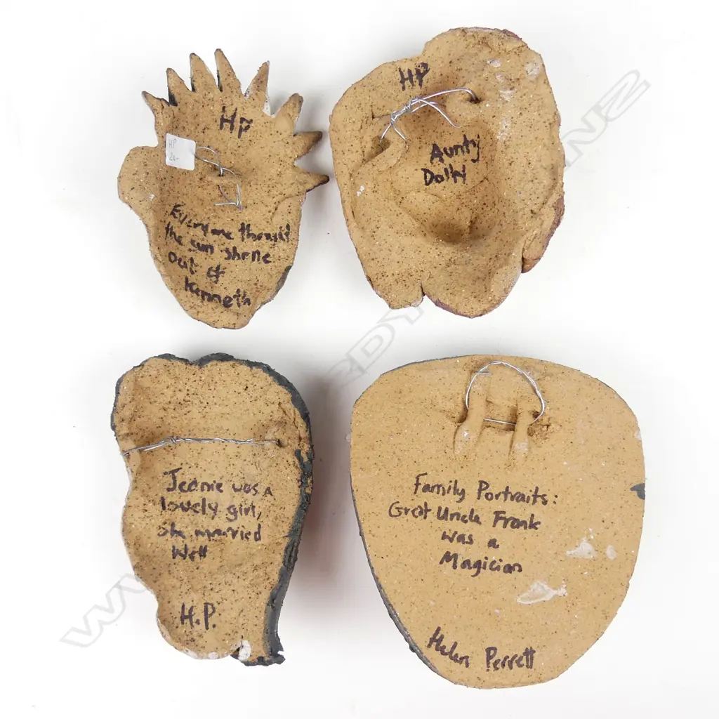 Four Helen Perrett sculpted pottery 'Family Portraits' wall masks Image 1++