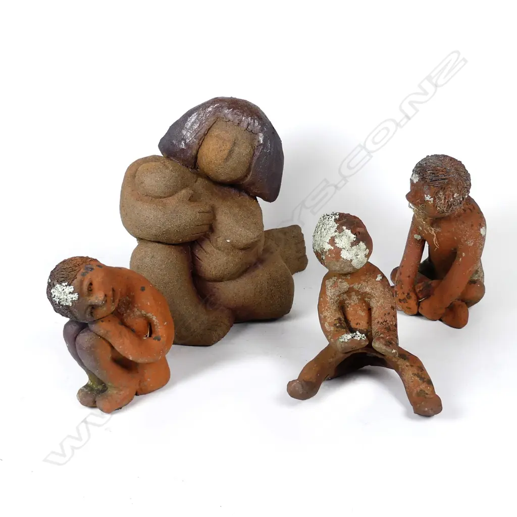 A terracotta sculpted mother and child Image 1++