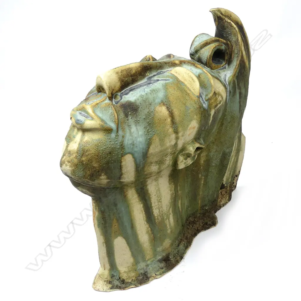 A pottery bust of a woman Image 1++