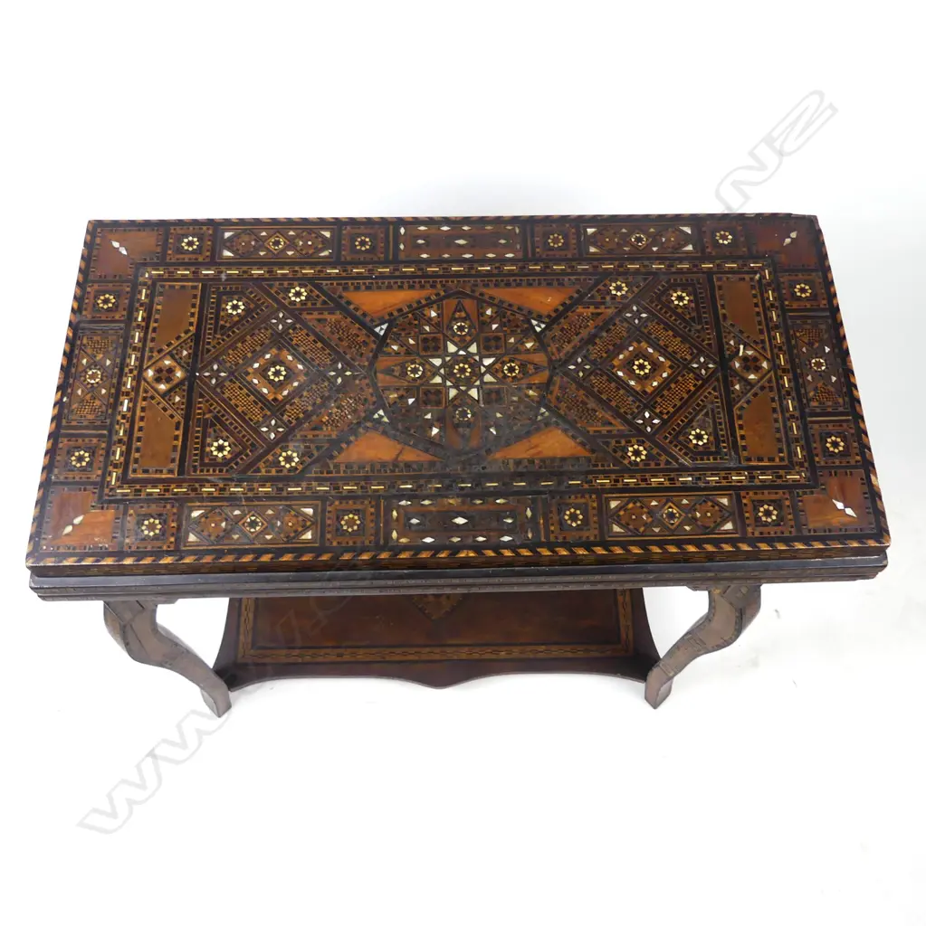 A fine Syrian inlaid fold-over games table Image 1++